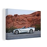 Leinwandbild - 2016 Chevrolet Corvette C7 Stingray Cabrio. Farbe: Blade Silver Metallic. Fotografiert im Valley of Fire State Park, Nevada. Mehr I