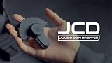 Murphy's Magic Supplies, Inc. Hanson Chien präsentiert JCD (Jumbo Coin Dropper) von Ochiu Studio (Black Holder Series) – Trick