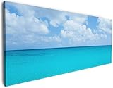 Wallario Leinwandbild Sandstrand und blaues Meer - 50 x 125 cm: Brillante lichtechte Farben, hochauflösend, verzug