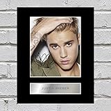 Bild mit Foto und Unterschrift von Justin Bieb